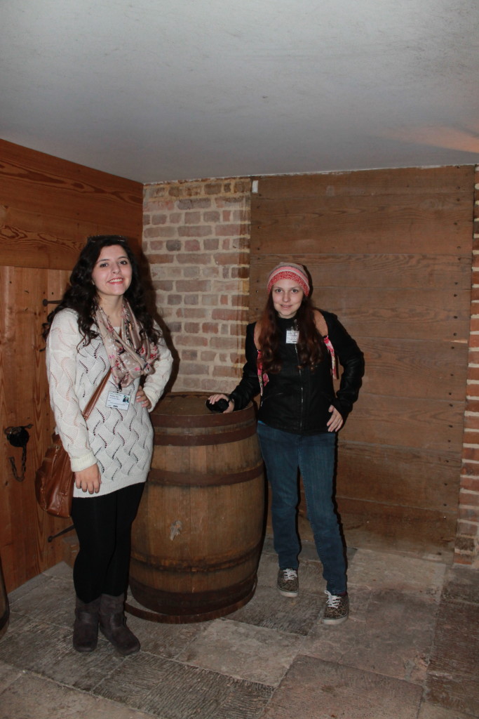 With Serena in the cellar, where they stored wine and spices.